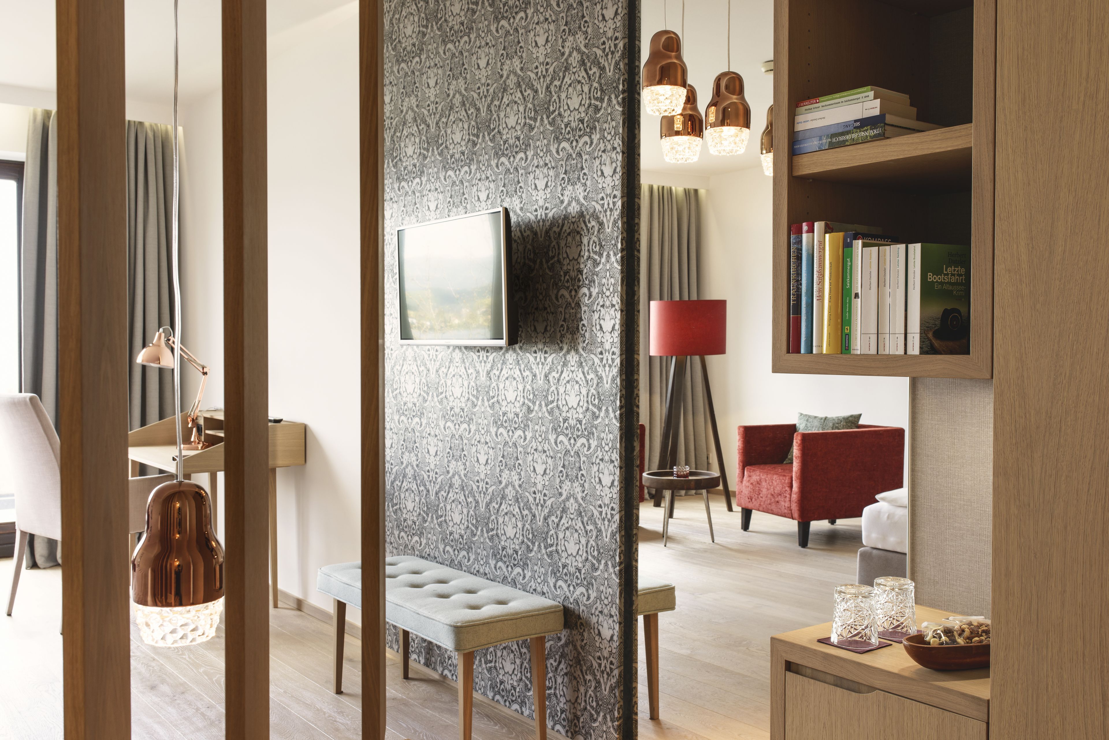 junior studio suite, 1 king bed, bathtub, lake view (salzkammergut) | living area | tv, tablet