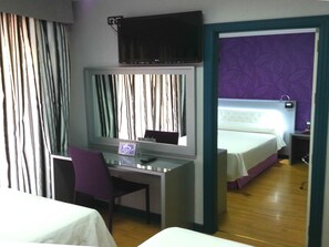 Memory-foam beds, in-room safe, desk, laptop workspace