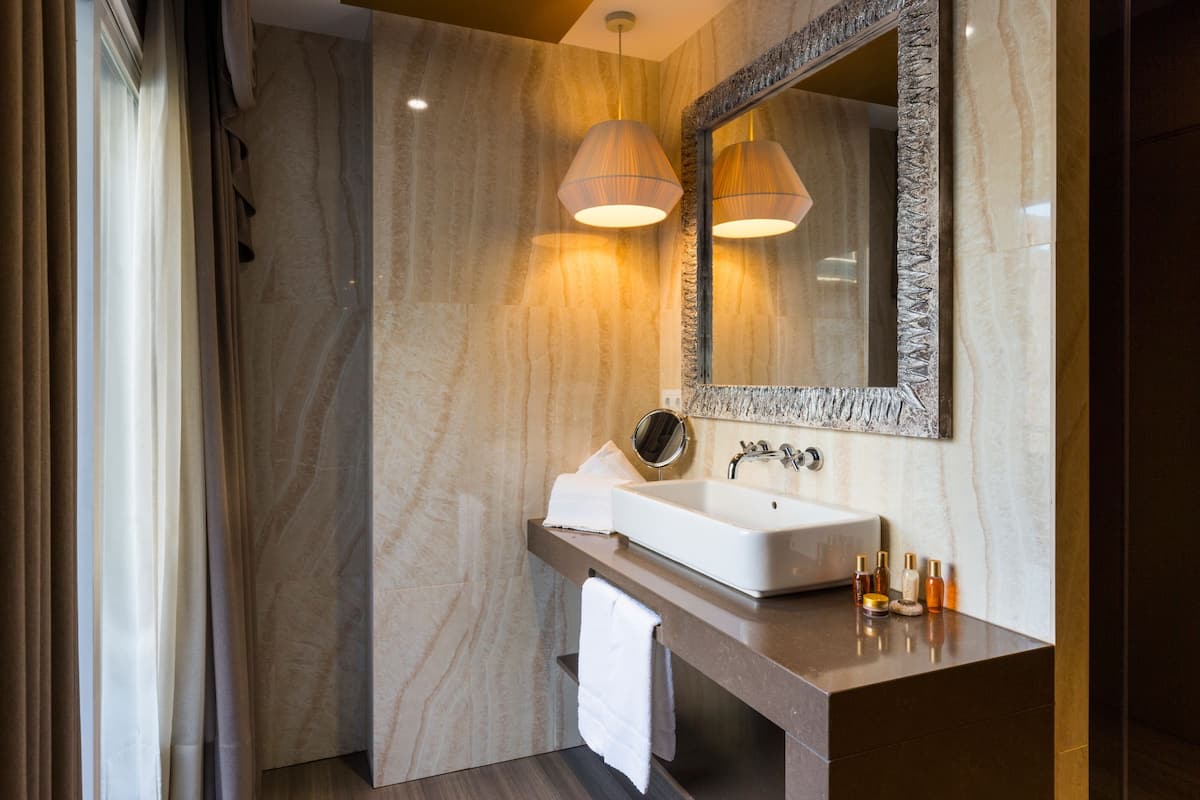 free toiletries, hair dryer, slippers, towels