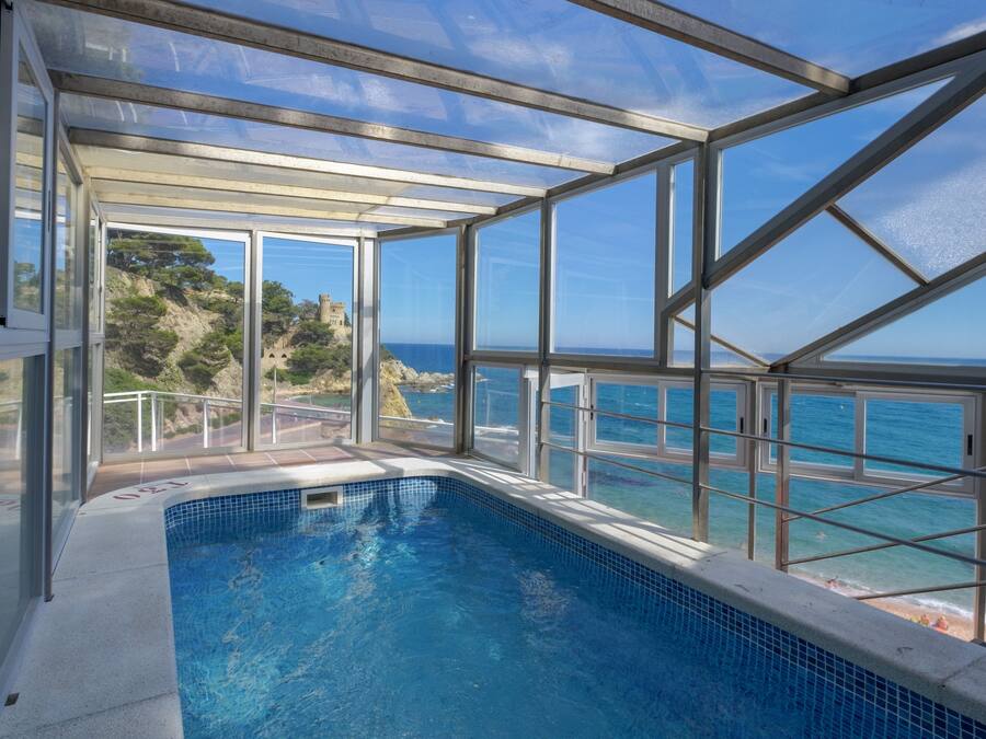 Indoor pool, seasonal outdoor pool, open 9 AM to 7:00 PM, pool umbrellas