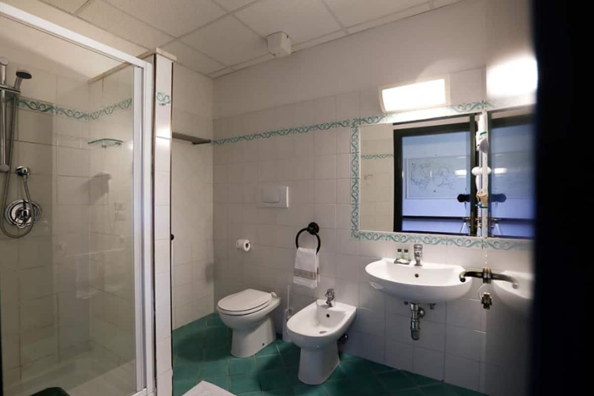 superior double or twin room, garden view | bathroom | shower, rainfall showerhead, eco-friendly toiletries, hair dryer