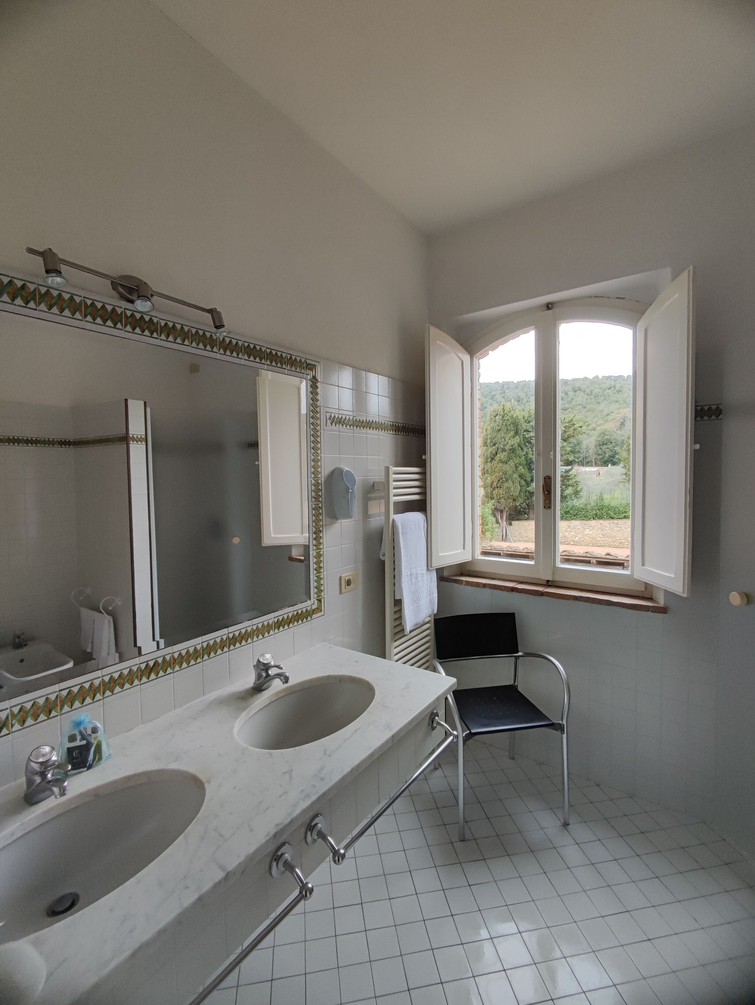 family condo | bathroom | shower, rainfall showerhead, eco-friendly toiletries, hair dryer