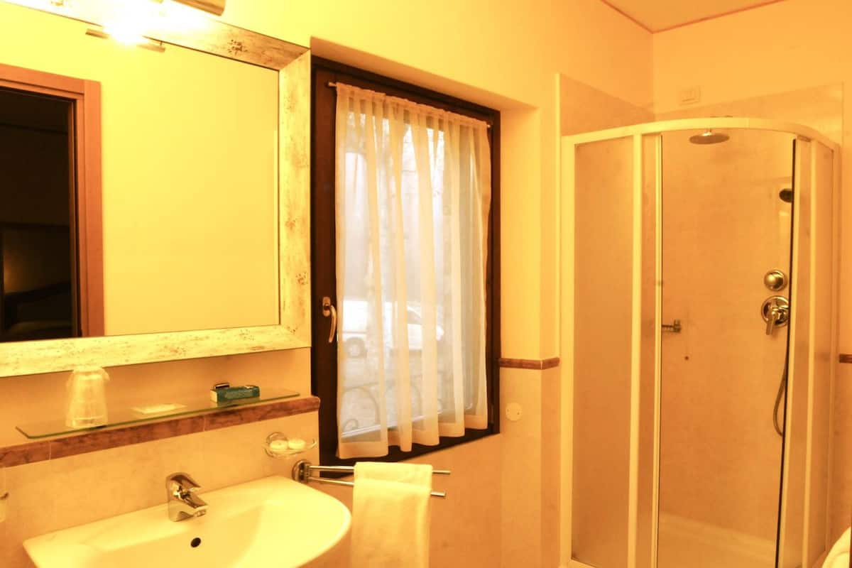 bathtub, free toiletries, hair dryer, towels