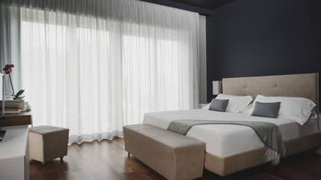 Habitación Confort | Sábanas de algodón egipcio y minibar