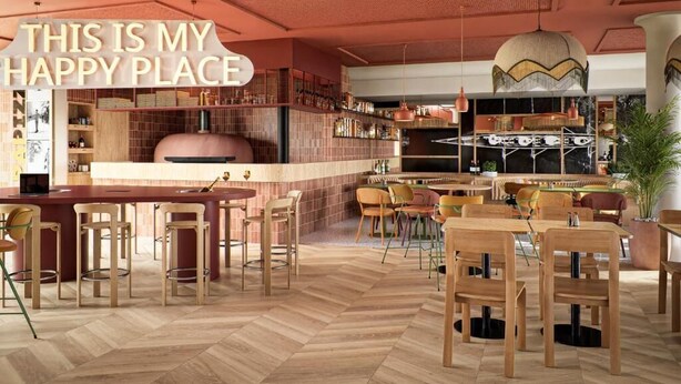 A restaurant interior with a bar area, wooden furniture, and a large pizza oven. - ibis Styles Annecy Le Vieux (Annecy)