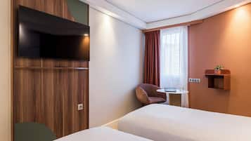 Literie de qualité supérieure, coffres-forts dans les chambres, bureau