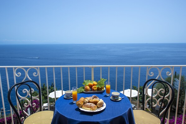 Standard Quadruple Room, Balcony, Sea View | Terrace/patio