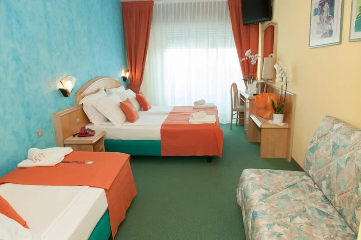 Luxe beddengoed, een minibar, een kluis op de kamer, een bureau