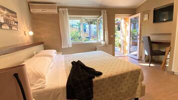 Desk, laptop workspace, free WiFi, bed sheets