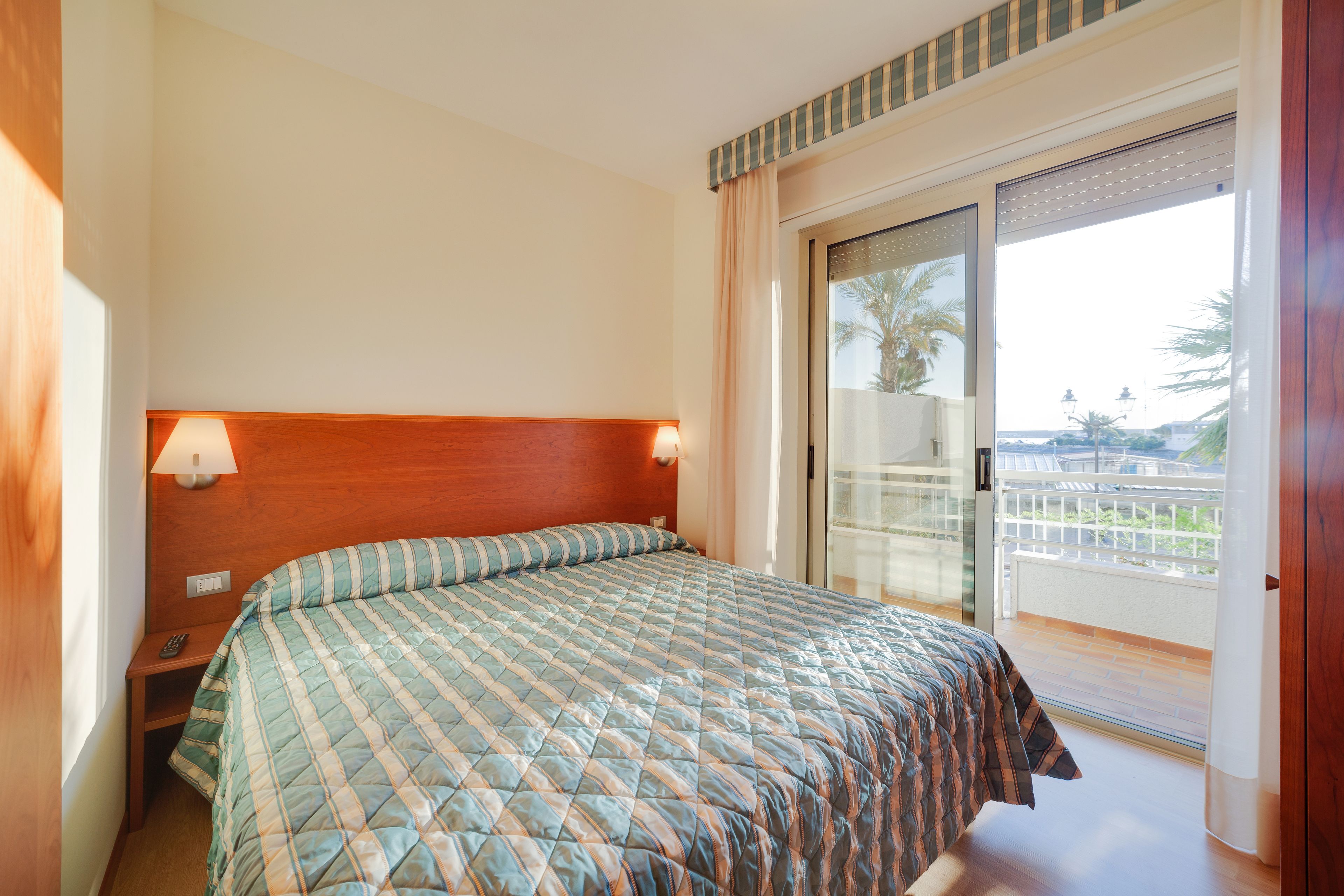 Comfort Apartment, 1 Bedroom, Kitchenette | In-room safe, iron/ironing board, free WiFi, bed sheets