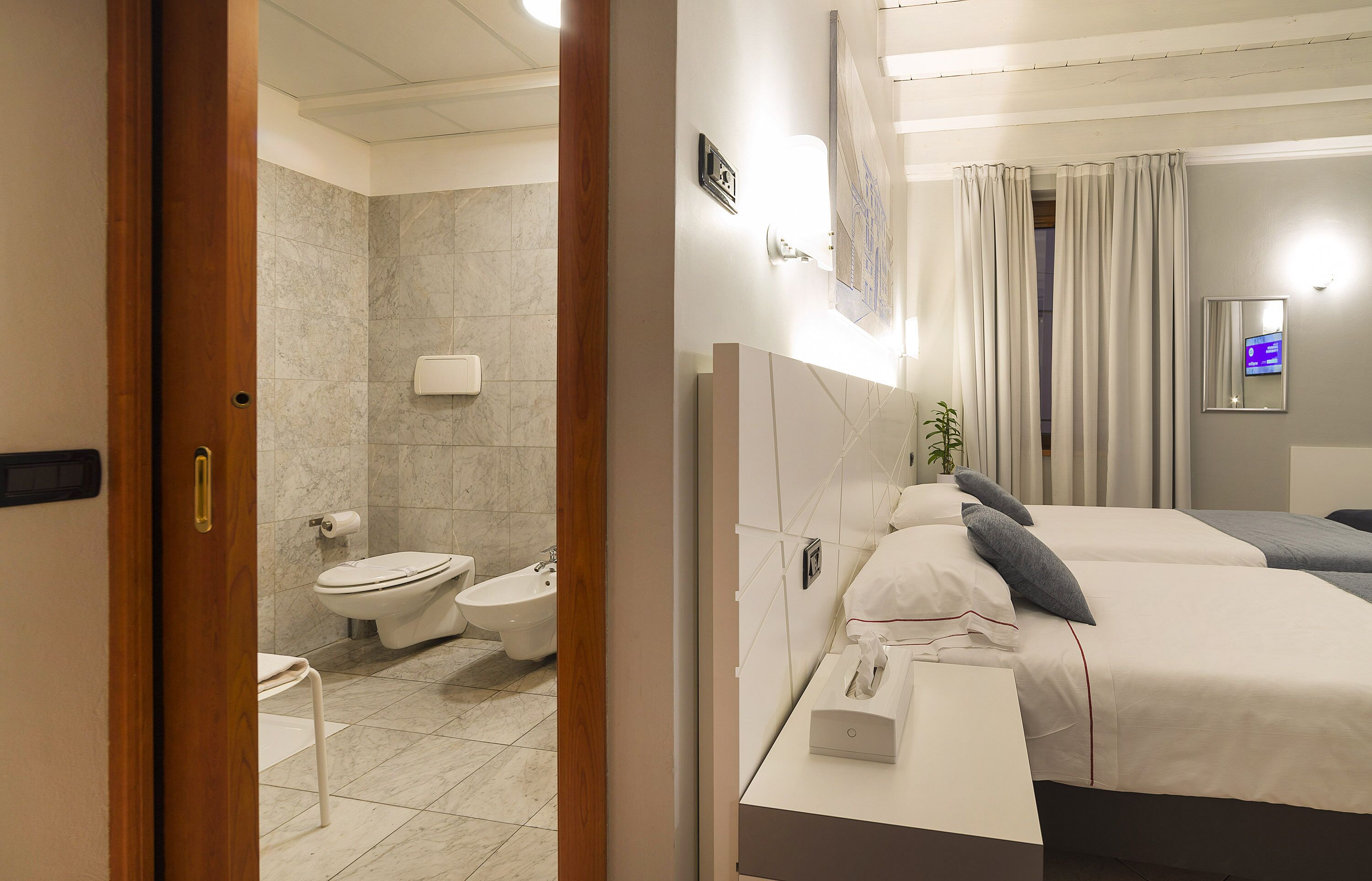 double room with extra bed | 1 bedroom, in-room safe, desk, blackout curtains