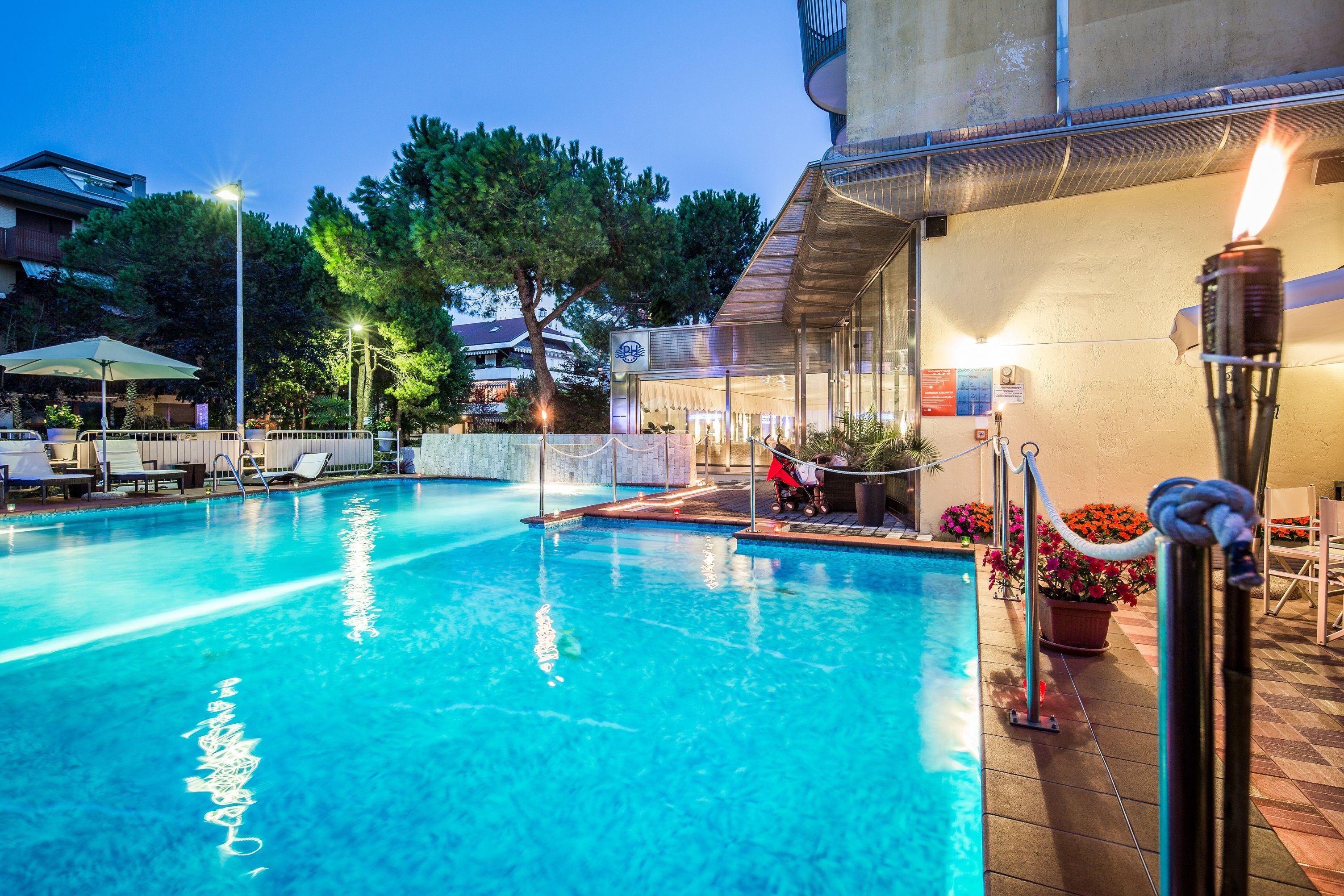 outdoor pool, pool umbrellas, pool loungers