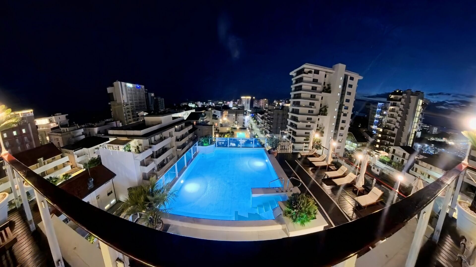 seasonal outdoor pool, open 9:00 am to 9:00 pm, pool umbrellas