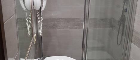 Shower, free toiletries, hair dryer, towels