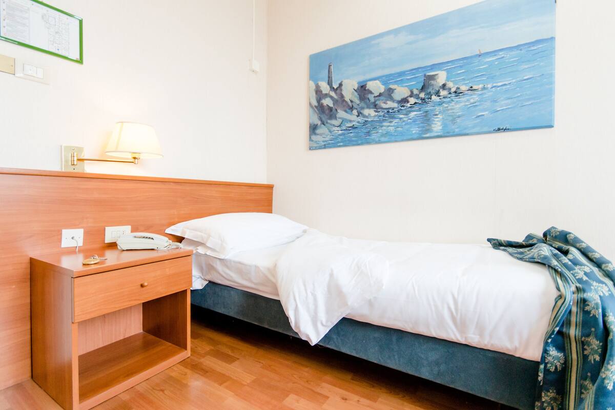 Single Room | Premium bedding, down duvets, memory-foam beds, minibar