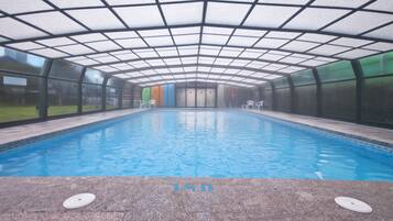 Indoor pool, outdoor pool, open 9:00 AM to 9:00 PM, pool loungers