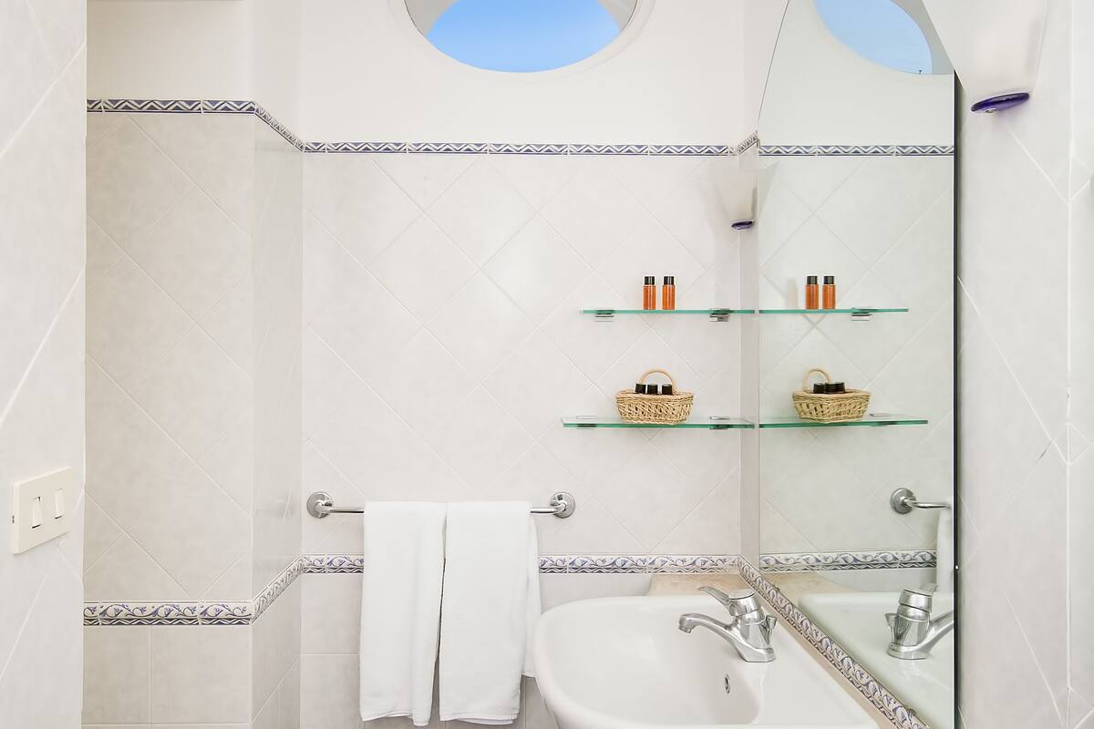 free toiletries, hair dryer, bidet, towels