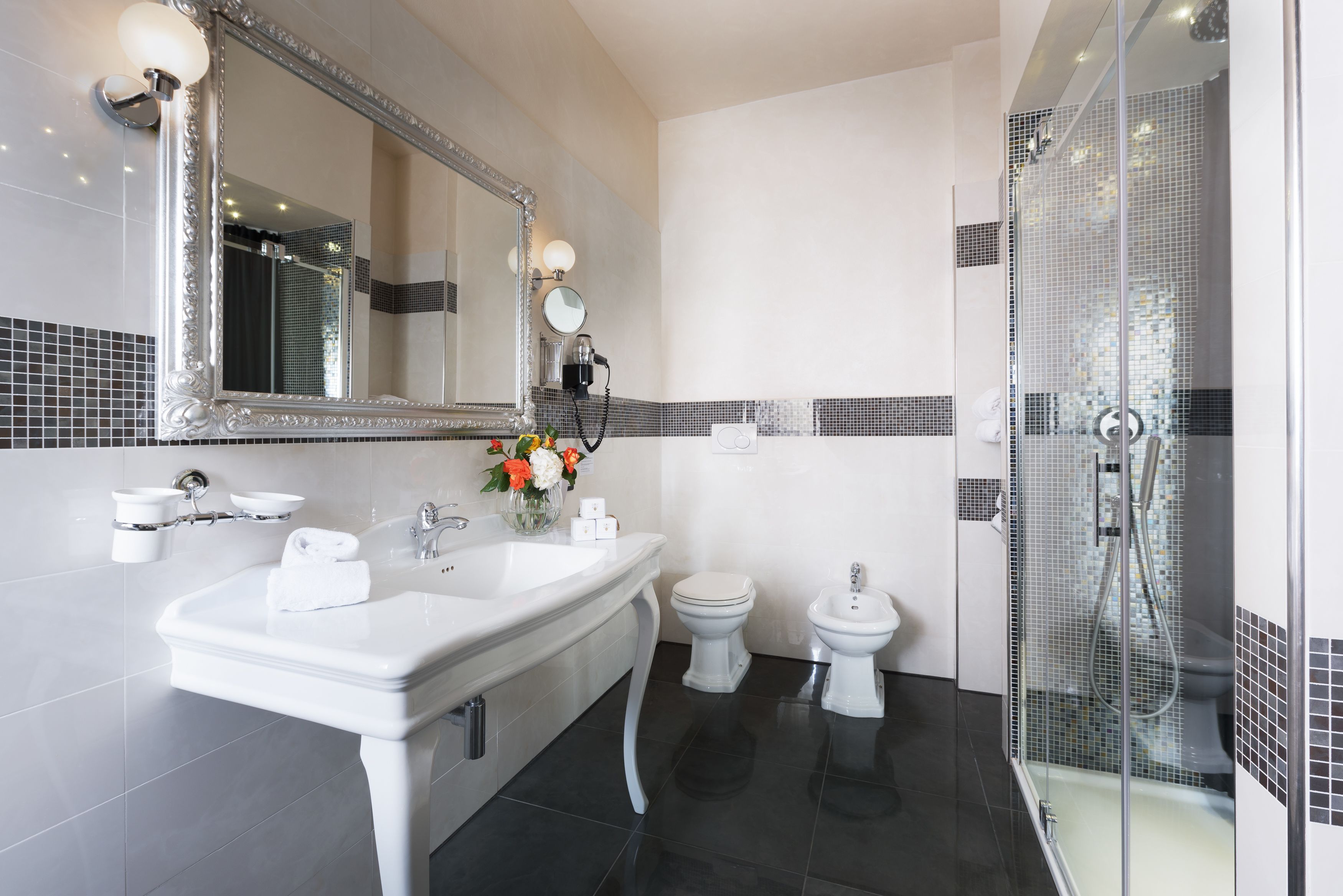 junior suite | bathroom | designer toiletries, hair dryer, bidet, towels