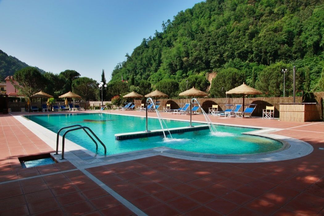 Outdoor pool, pool umbrellas, pool loungers