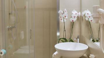 Shower, free toiletries, hair dryer, slippers