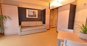 Apartment, 1 Bedroom | Living area | LCD TV