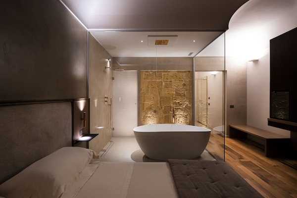 Junior-Studiosuite, 1 King-Bett, Badewanne | 1 Schlafzimmer, Daunenbettdecken, Minibar, Zimmersafe