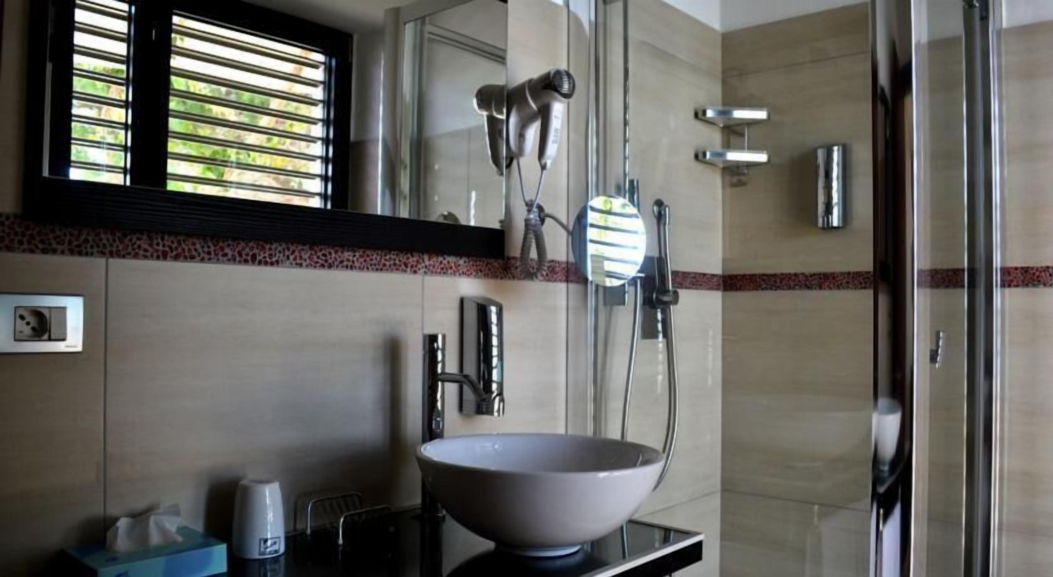 hair dryer, bidet, towels