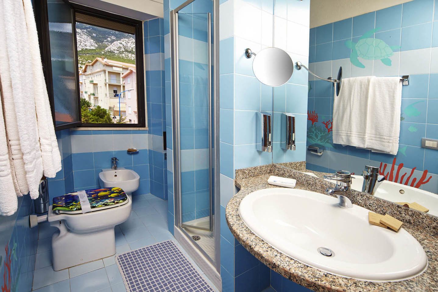 hair dryer, bidet, towels