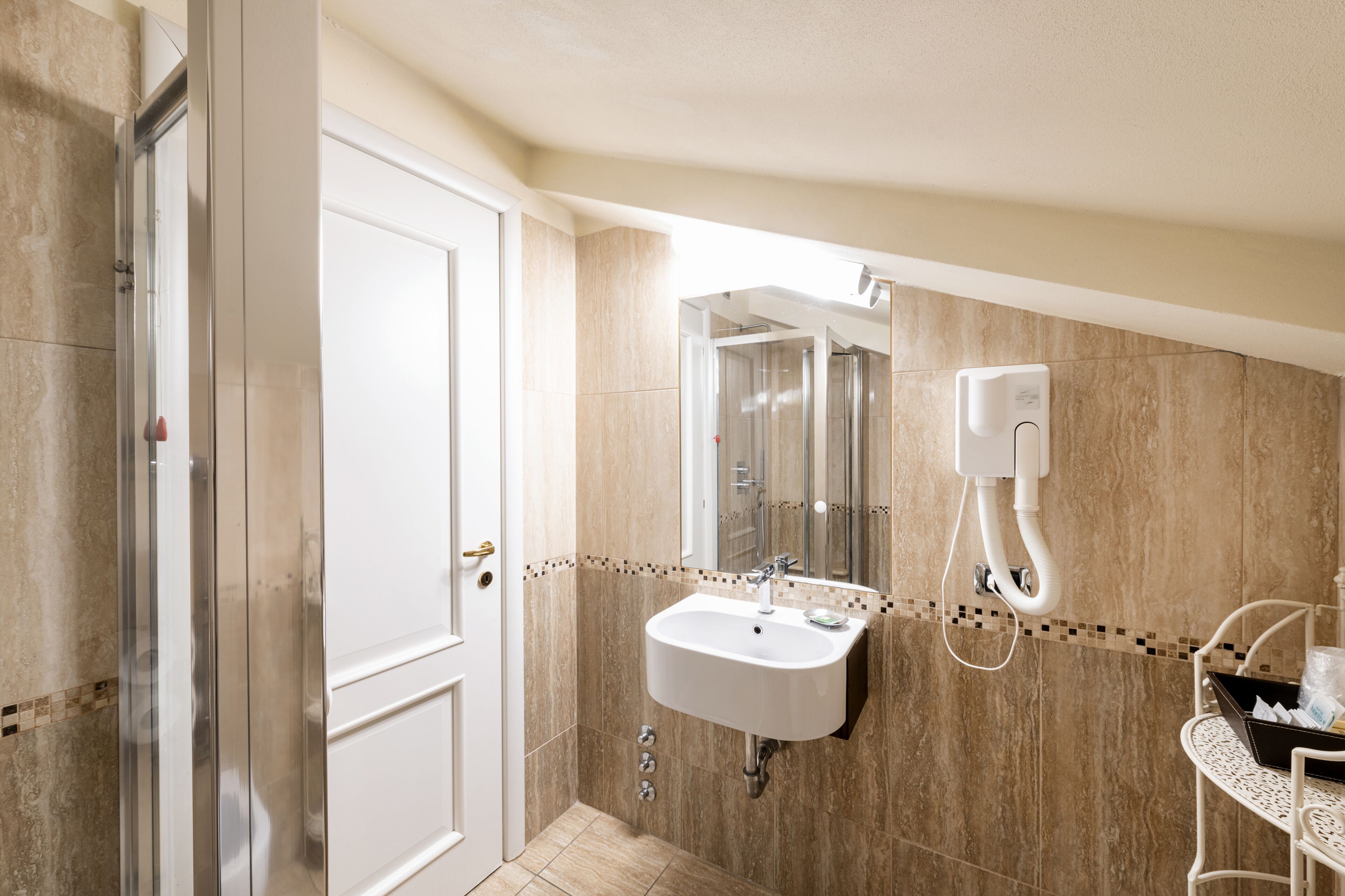 free toiletries, hair dryer, bidet, towels