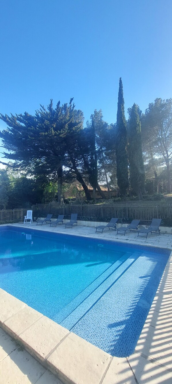 2 outdoor pools, open 6:00 PM to 10:00 PM, pool umbrellas, pool loungers