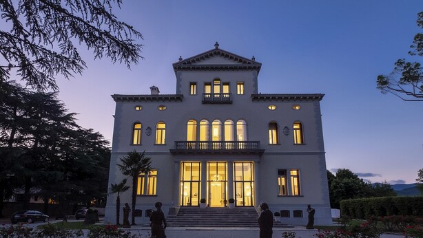 A large, two-story building with a symmetrical facade, large windows, and a central entrance with steps. - Hotel Villa Soligo - Small Luxury Hotels of the World (Farra di Soligo)