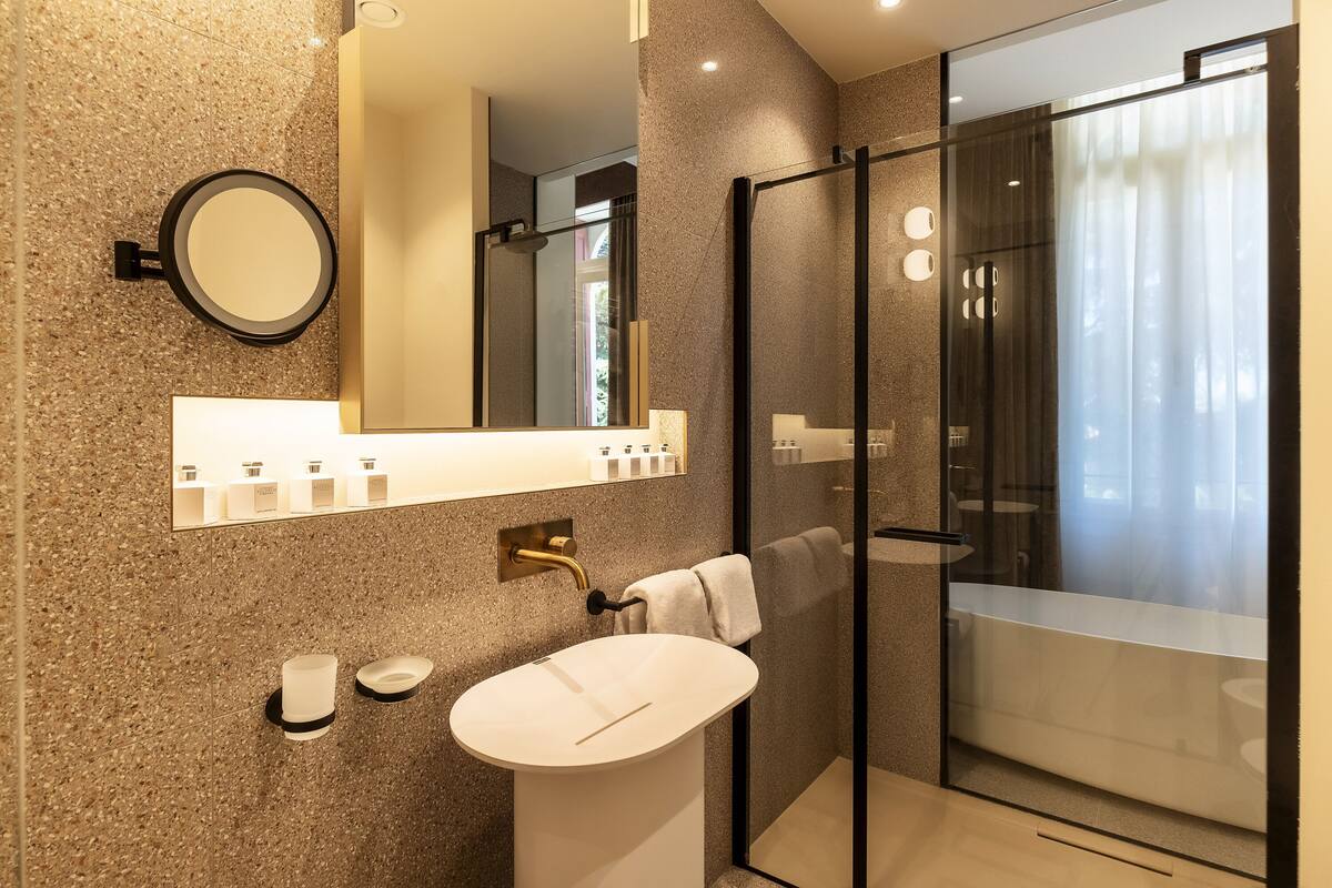 hair dryer, bathrobes, slippers, bidet