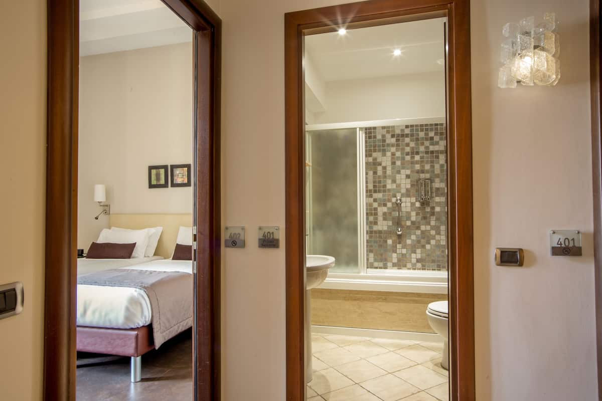 Eco-friendly toiletries, hair dryer, towels