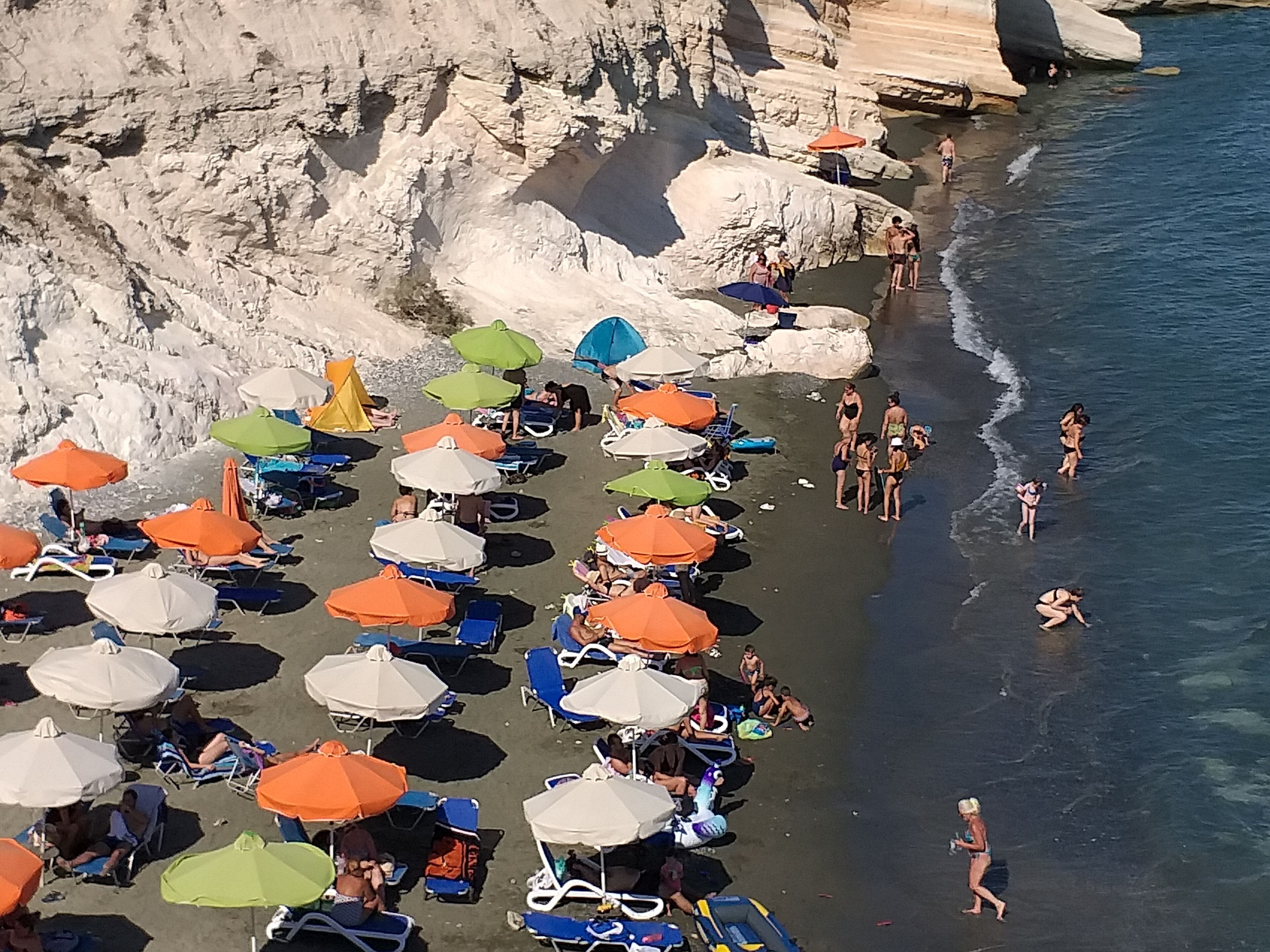private beach nearby, black sand, beach towels