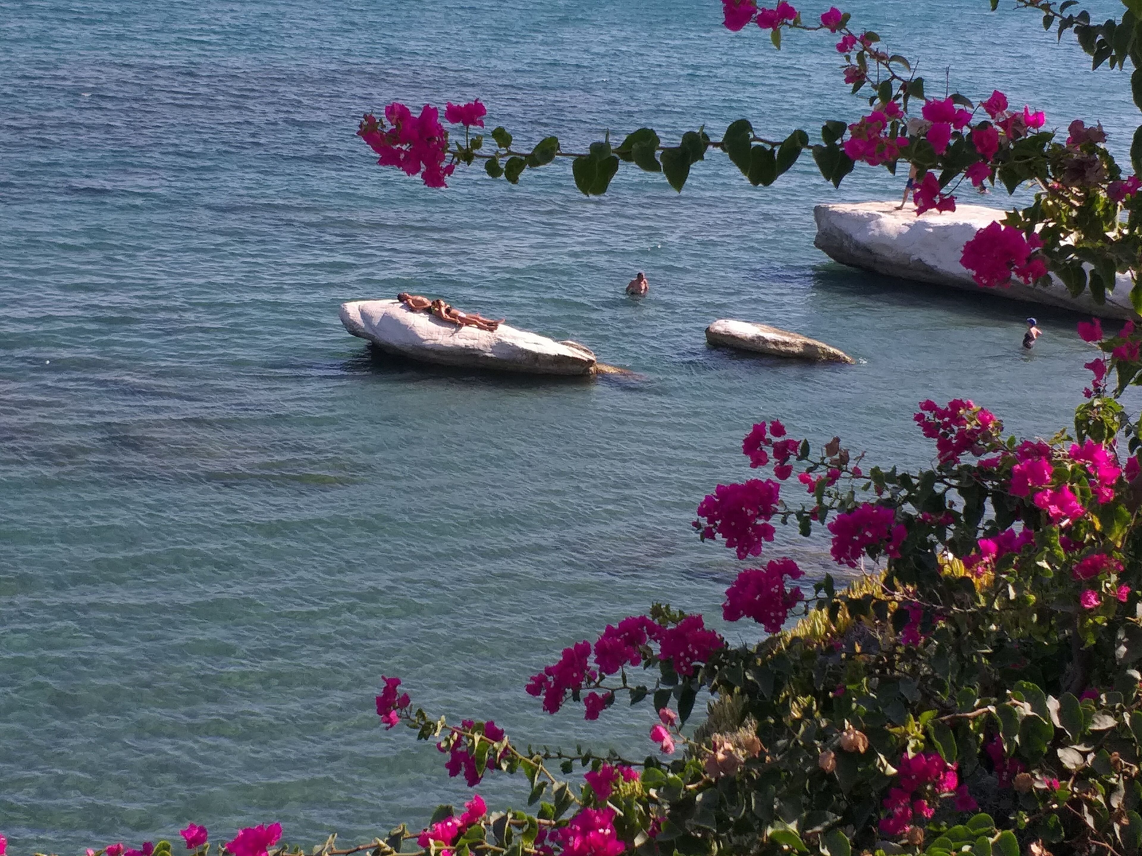 private beach nearby, black sand, beach towels