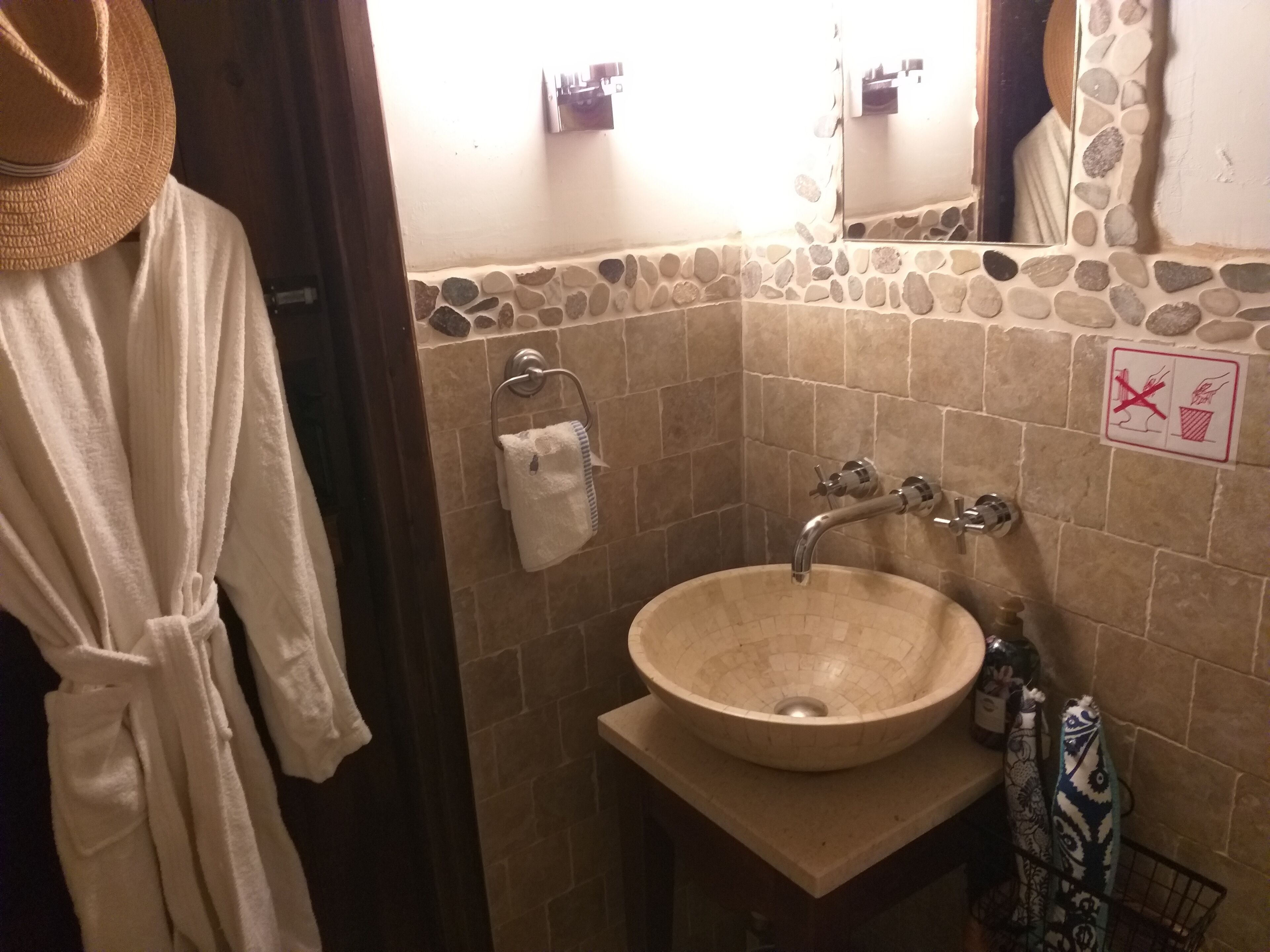 junior suite | bathroom | rainfall showerhead, designer toiletries, hair dryer, towels