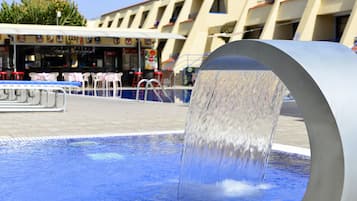 Seasonal outdoor pool, pool loungers