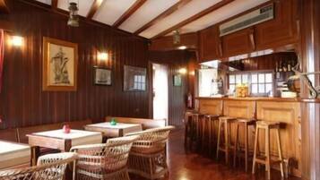 Fridge, microwave, coffee/tea maker, cookware/dishes/utensils