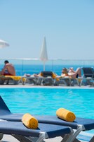 Seasonal outdoor pool, pool umbrellas, sun loungers