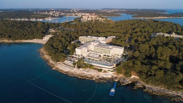 Situated on a rocky peninsula, this hotel offers stunning views of the surrounding sea and lush greenery.