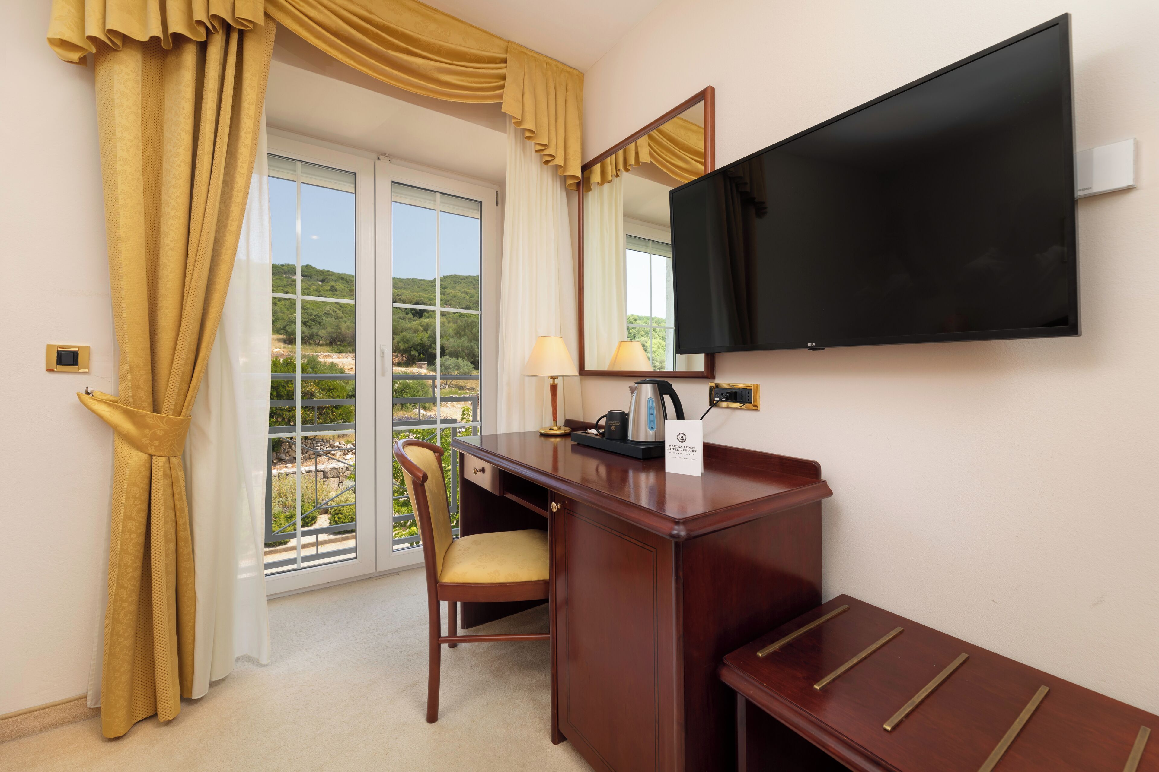 standard double or twin room, hill view | in-room safe, desk, blackout curtains, free wifi