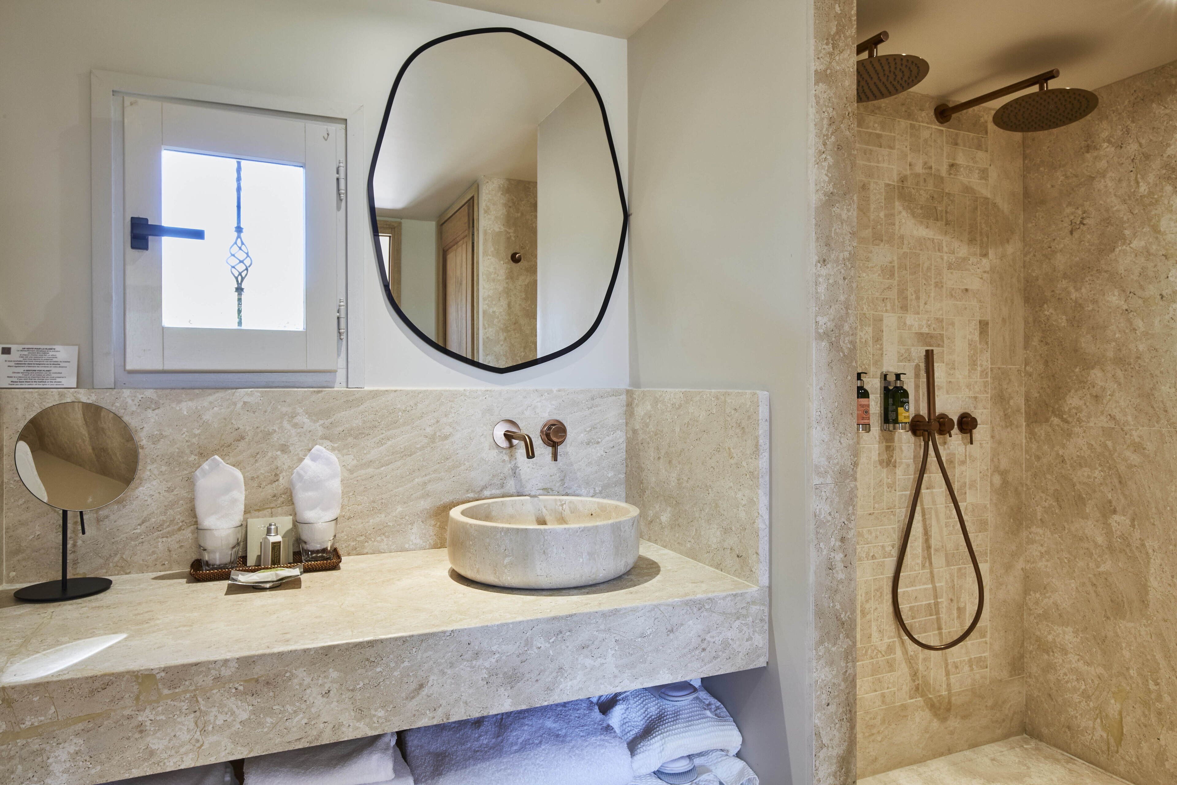 duplex family room | bathroom | combined shower/bathtub, hair dryer, slippers, towels