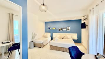 Dreibettzimmer, Balkon, Meerblick | Schreibtisch, schallisolierte Zimmer, kostenloses WLAN