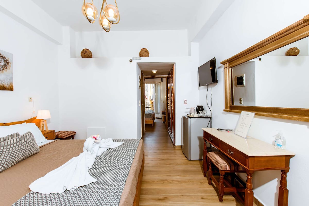 Quadruple Room - 2 double beds | Een strijkplank/strijkijzer, gratis wifi, beddengoed