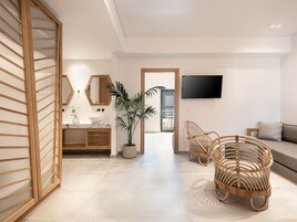 Apartamento Deluxe | Zona de estar