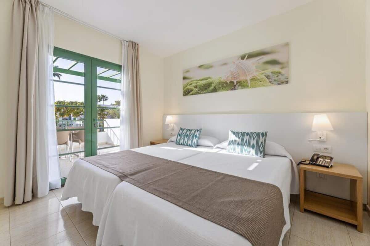 In-room safe, blackout drapes, cribs (free), WiFi (free)