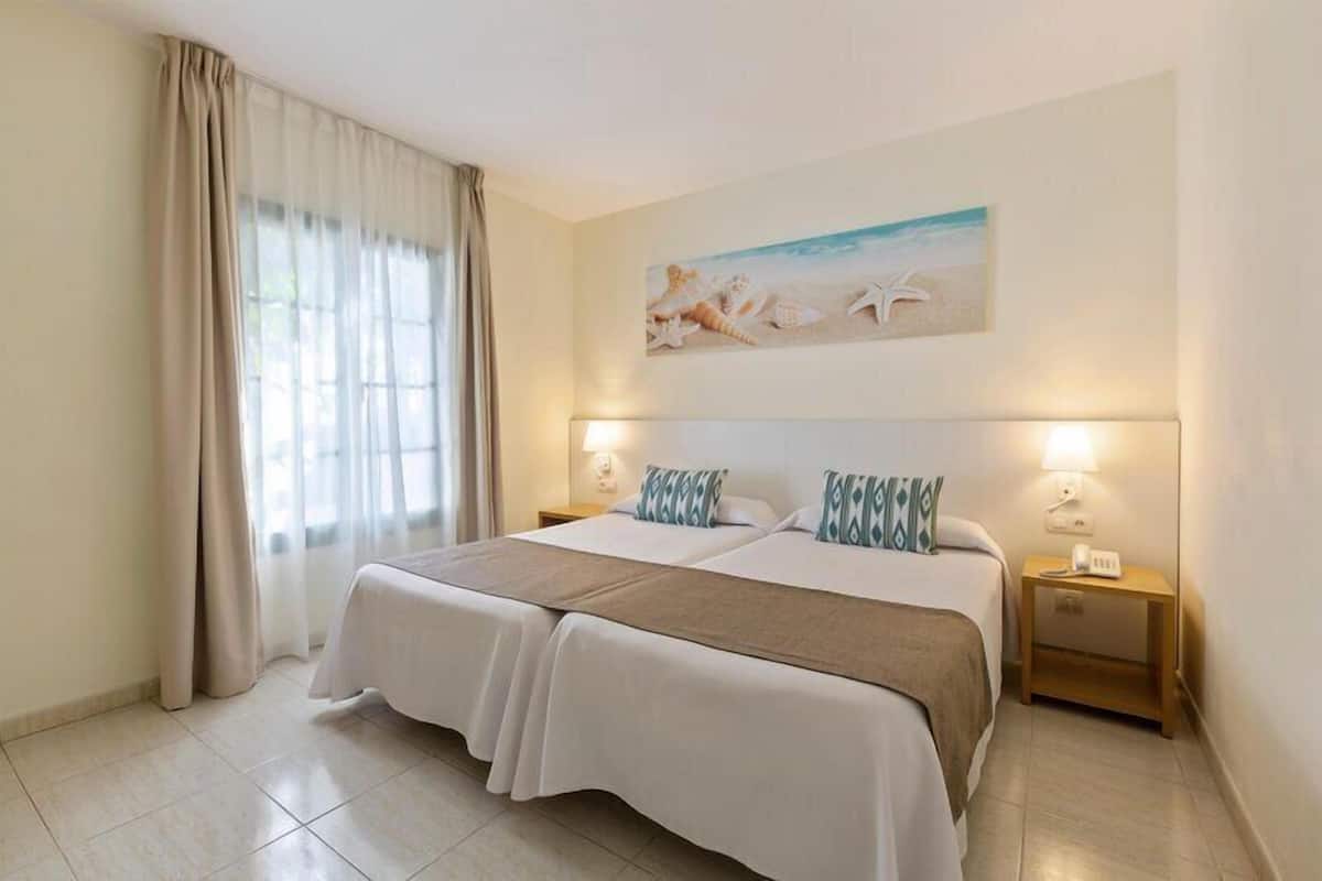In-room safe, blackout drapes, cribs (free), WiFi (free)