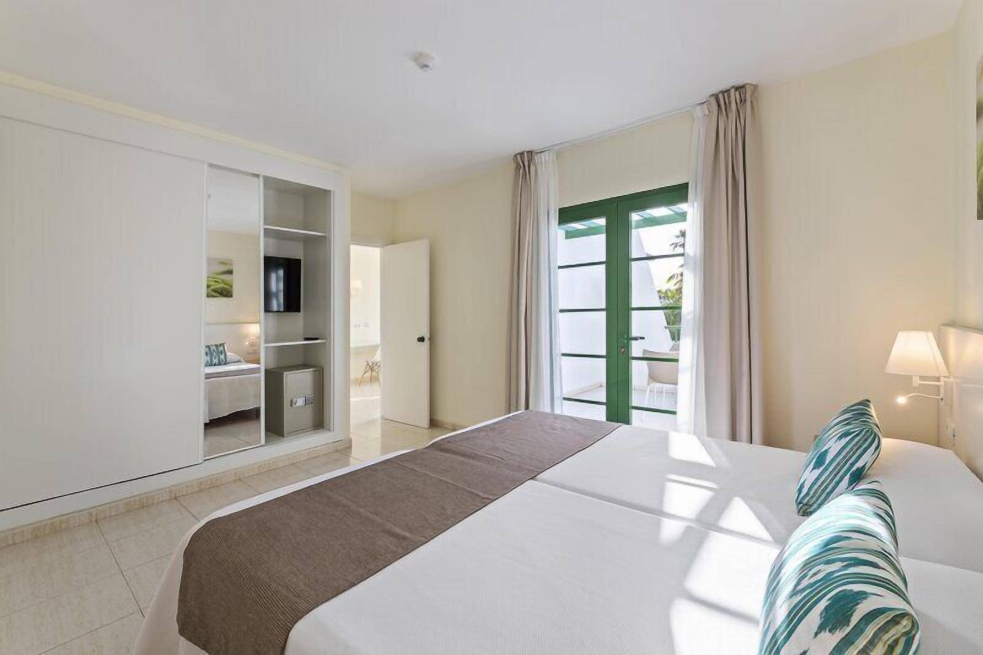 In-room safe, blackout drapes, cribs (free), WiFi (free)