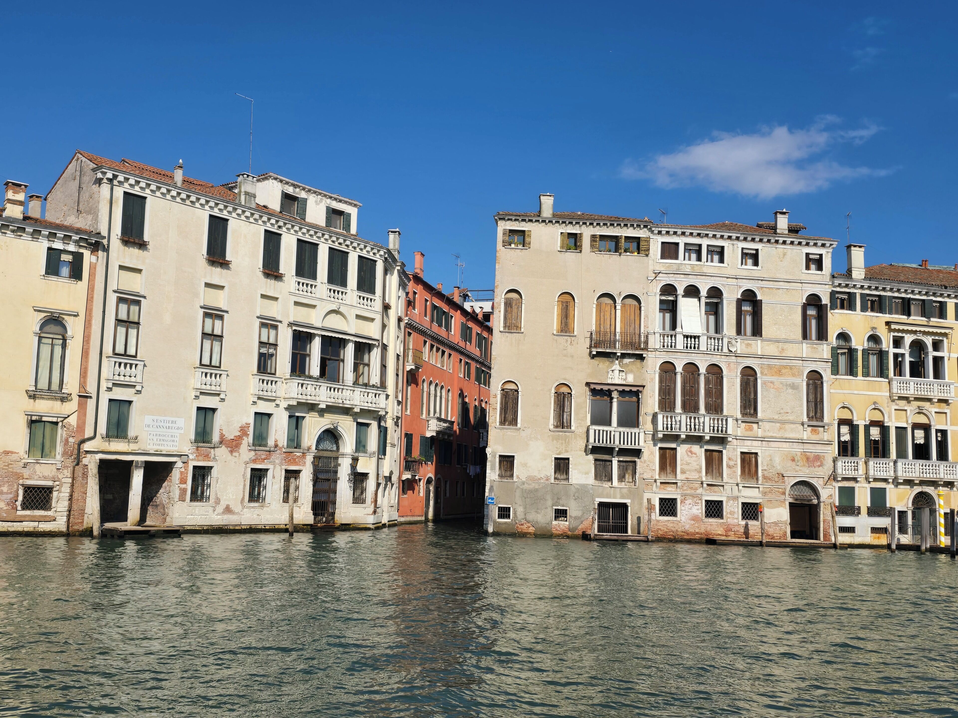 A canal with historic buildings on either side.