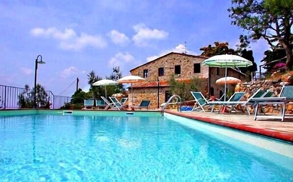 Seasonal outdoor pool, pool umbrellas, pool loungers